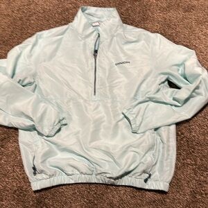 Cinch Ladies windbreaker. Mint color. Back vent. Zipper pockets. Size large